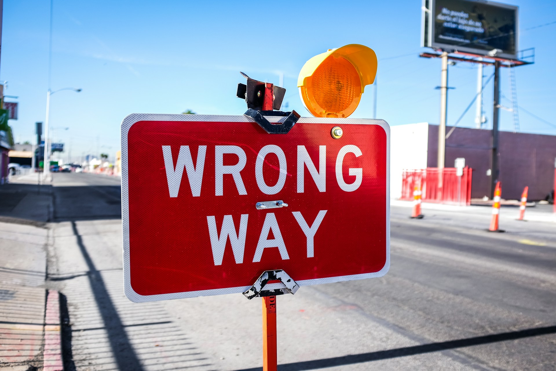Wrong Way Road Sign with flashing yellow light